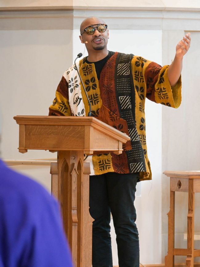 Person speaking at 2024 OBCS Sankofa Lectures